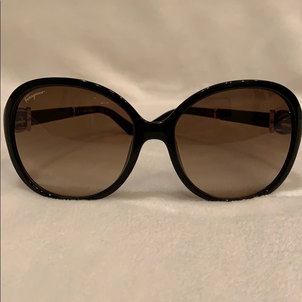Salvatore Ferragamo sunglasses good small scratch.